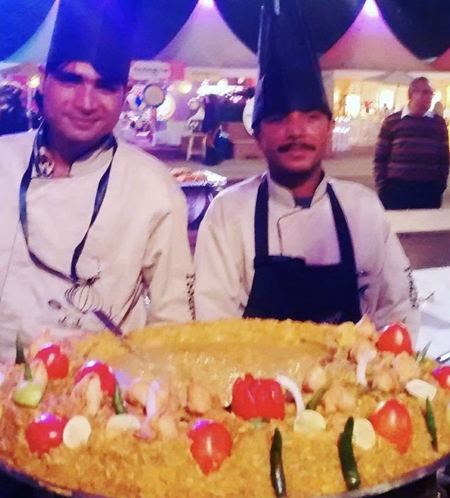 Chefs with a dish
